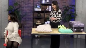 Dr. Nekessa Remy demonstrating a back stretch