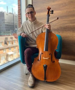 A man playing the cello