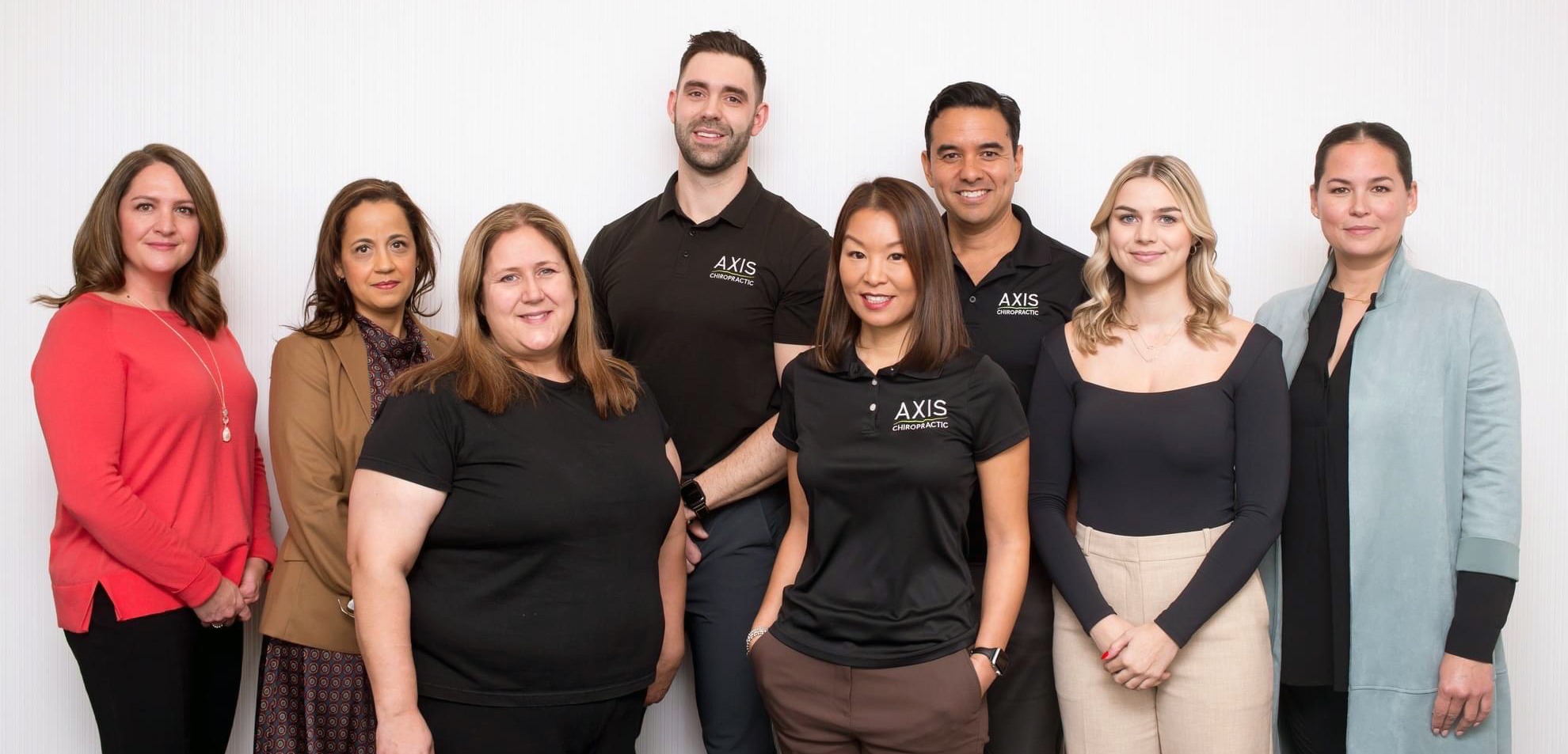Dr. Ellen Chin with Axis Chiropractic Team