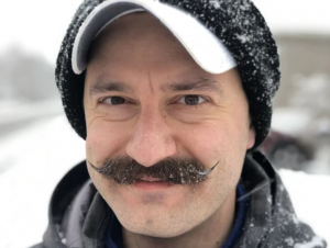 Dr. Mark Dickson shows his 'frosted tips' frozen moustache