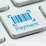 Electronic bill payment, financial concept : Barcode with a word Payment on a computer keyboard, depicts online money payment made for products or services via the internet from customers bank account