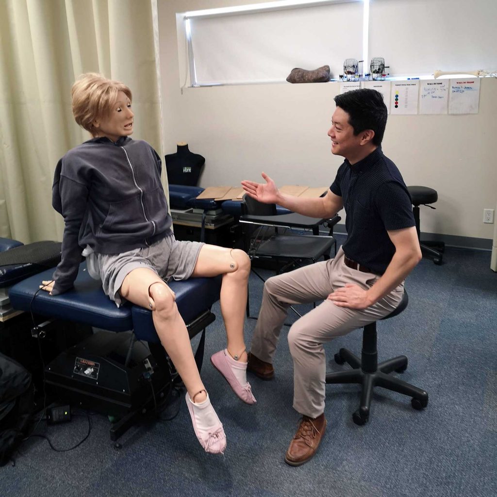 Grand-with-Suzie-simulation-Manikin Chiropractors' education at CMCC includes work with manikins like the one with this student