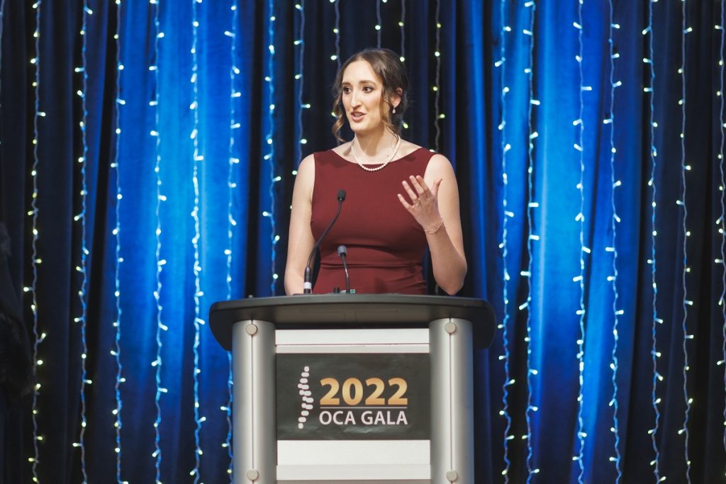 Dr. Kirstie Griffiths at podium