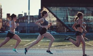 Three women running