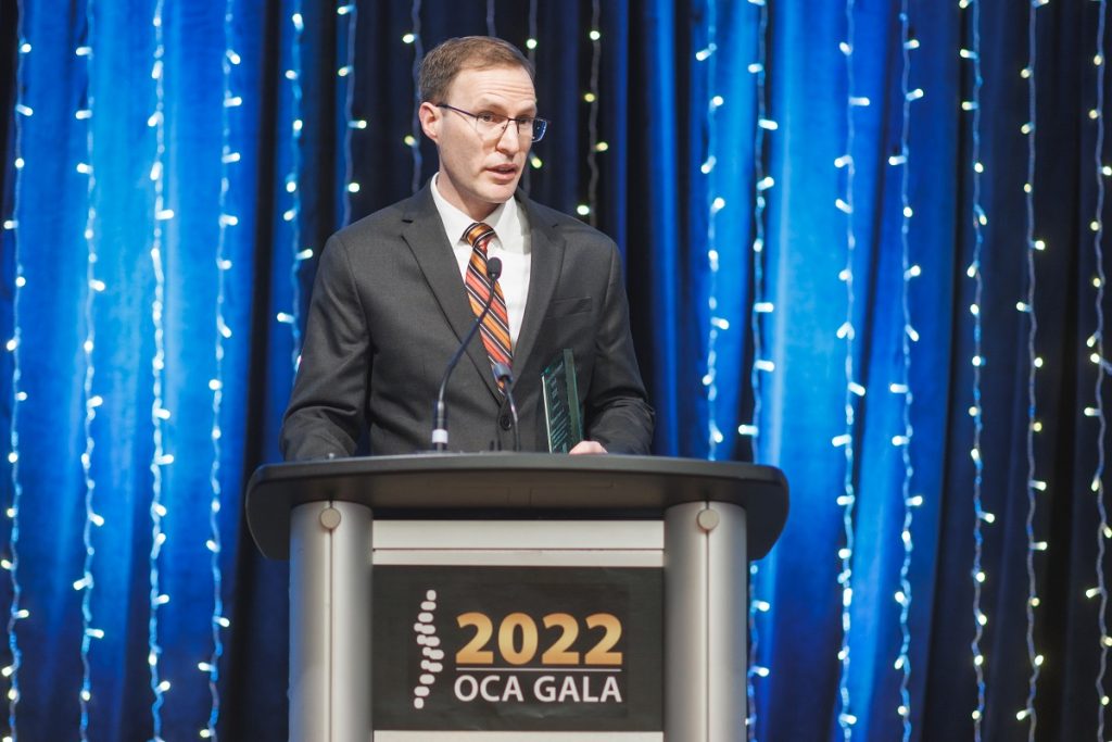 Dr. Peter Emary at podium