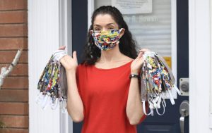 Dr. Emily Howell holding masks