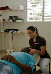 Dr. Patricia Tavares caring after a patient