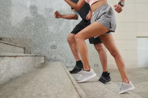 Two runners going up the stairs