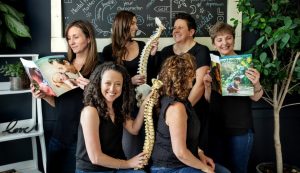 Dr. Danielle Warner with her team at Foster Family Chiropractic in Newmarket.