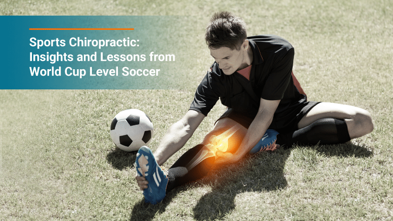 soccer playing doing seated stretch on field