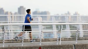 A photo of a man running.