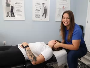 Dr. Melissa Myre with a patient.